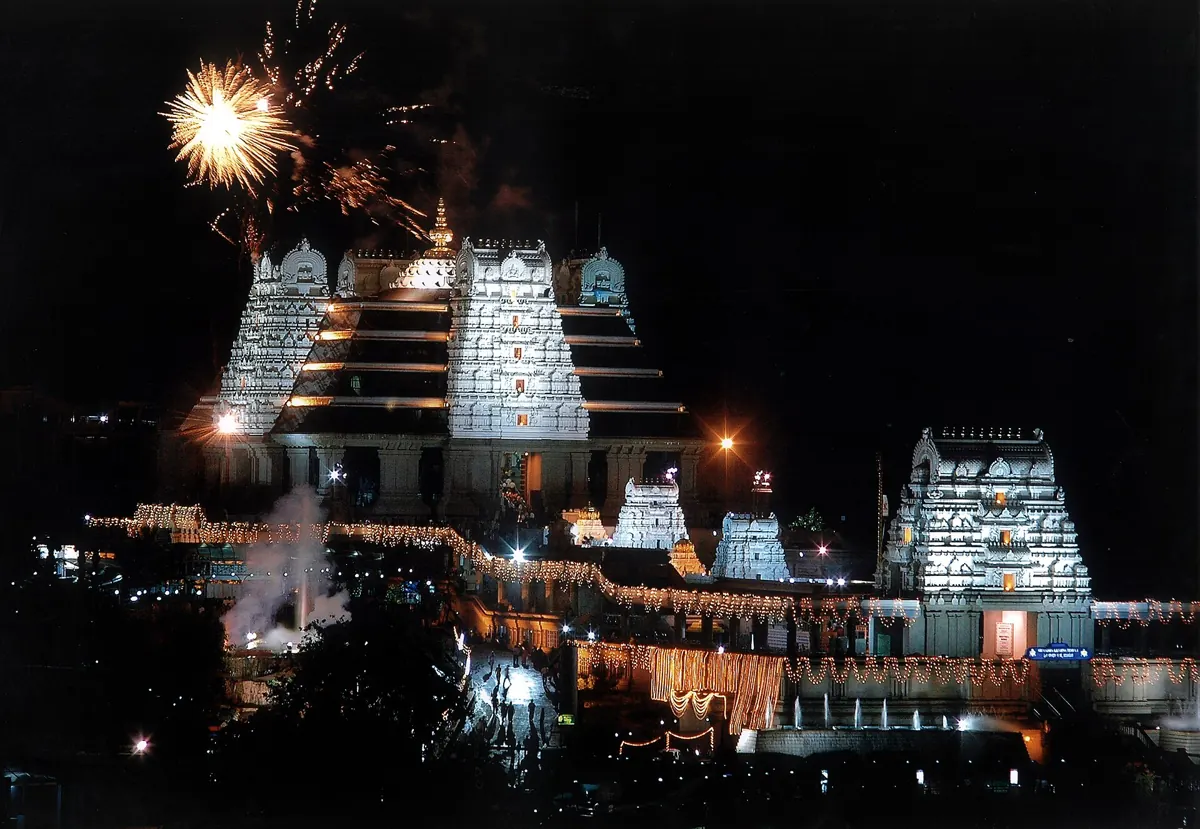 ISKCON Bangalore temple at night during the Brahmotsava festival